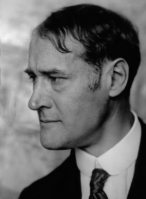 Lyonel Feininger in profile, with tousled hair.