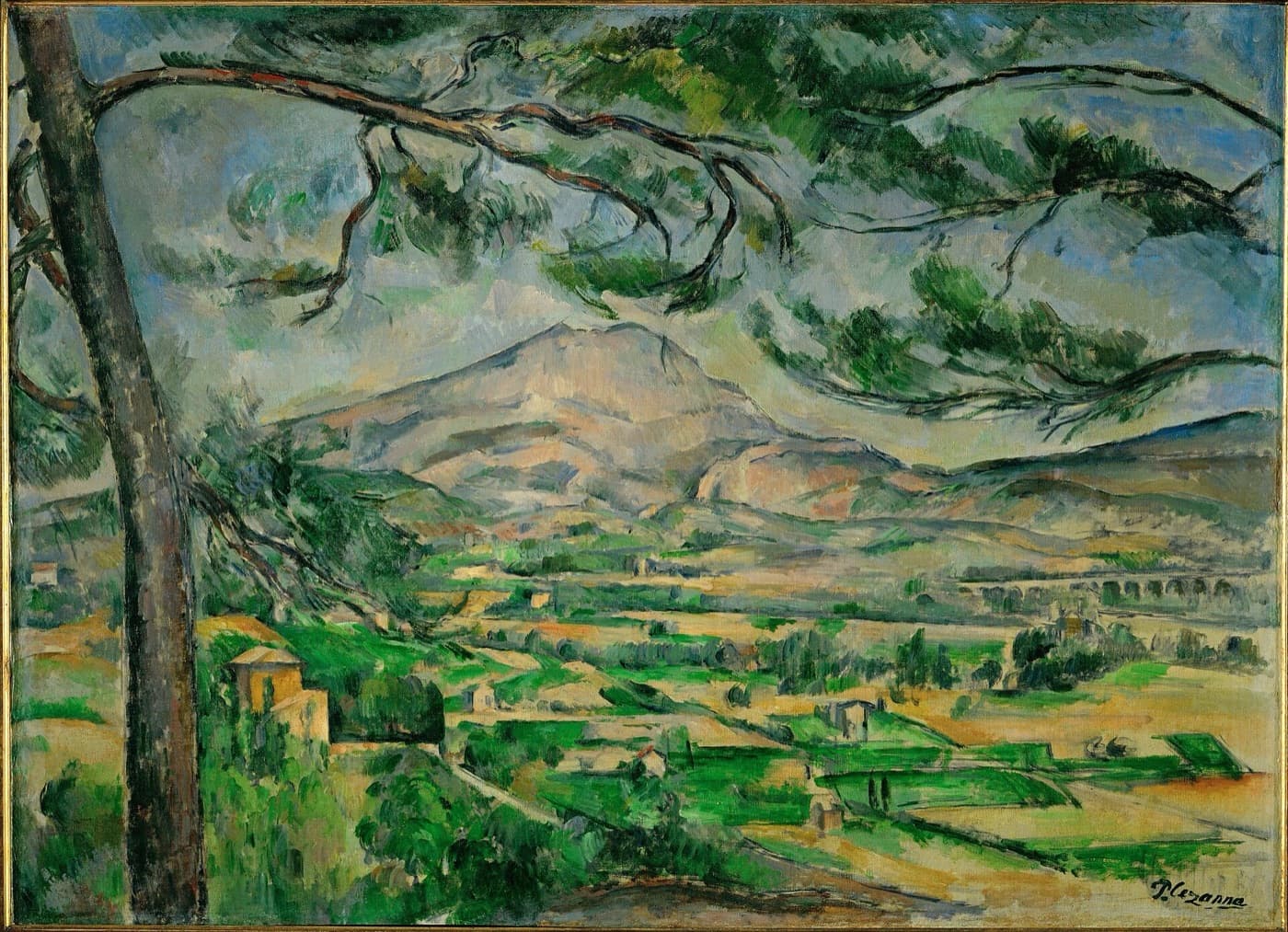 Cézanne's Montagne Sainte-Victoire with Large Pine: the mountain beyond a wide valley and a viaduct, framed by the branches of a pine.