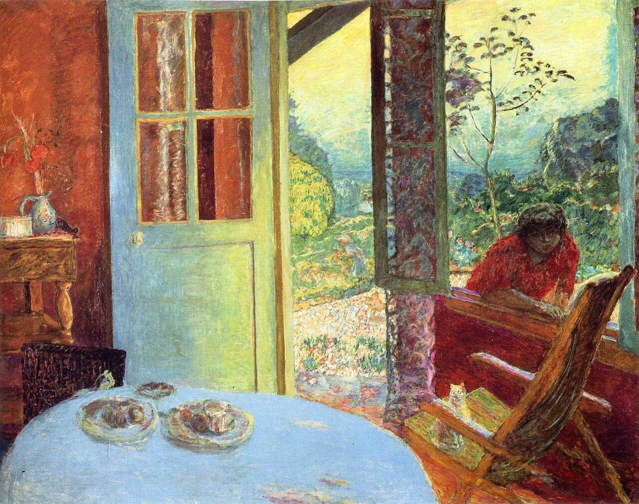 Bonnard's Dining Room in the Country: an open door and window onto a sunlit garden, with a woman leaning in at the window and a table laid in the foreground.